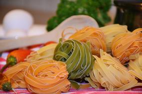 multicolored pasta on the kitchen table