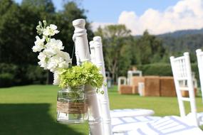 chairs in the garden for wedding