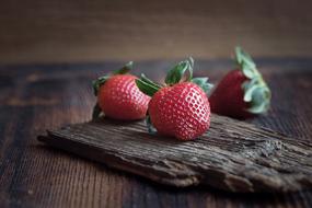 Strawberries Red wood table