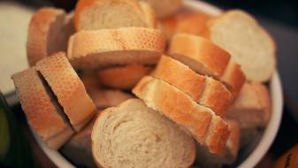 chopped fresh baguette in a white bowl