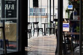 photo of tables and chairs in a cafe