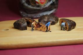 miniature men bearing Advent Chocolate Pastries