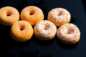 six Donuts with frosting