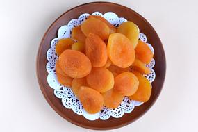 delicious dried apricots on a plate