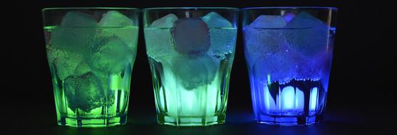Illuminated Ice Cubes in Glasses