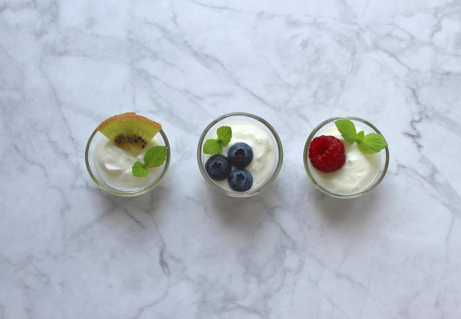 three glasses with delicious Yogurt