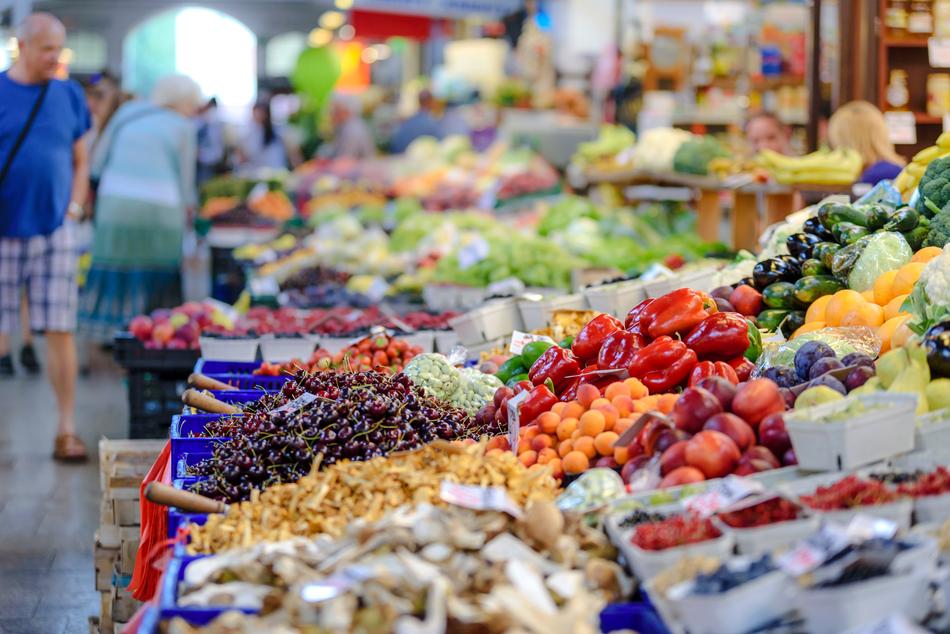 Colorful and beautiful food on the market, for sale, among the people