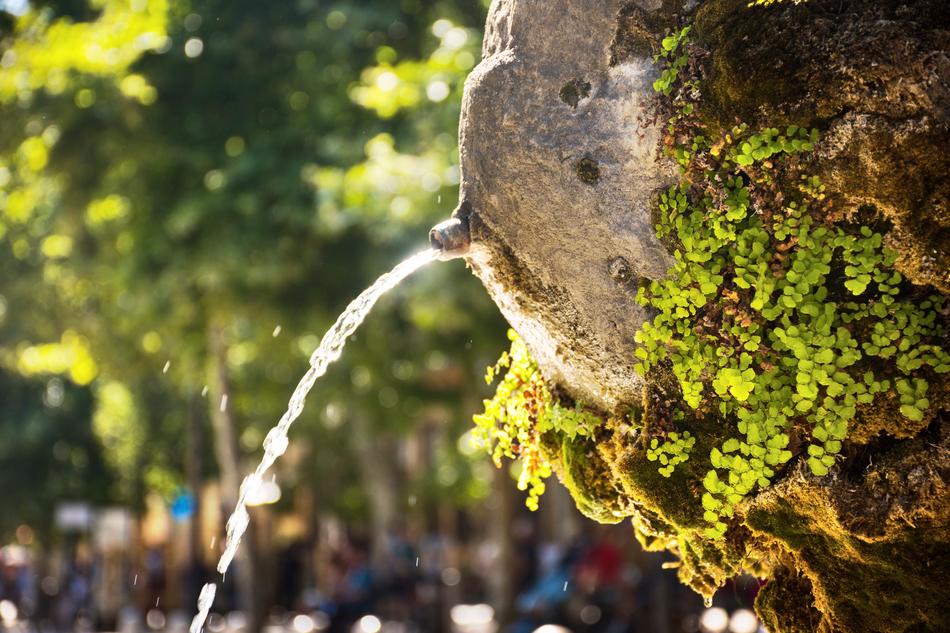 aged stone Water Fountain outdoor