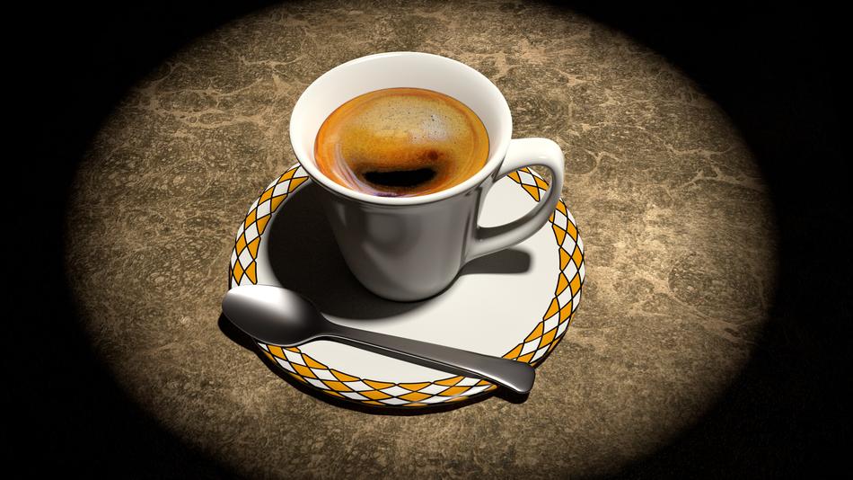 cup of coffee under the lamp