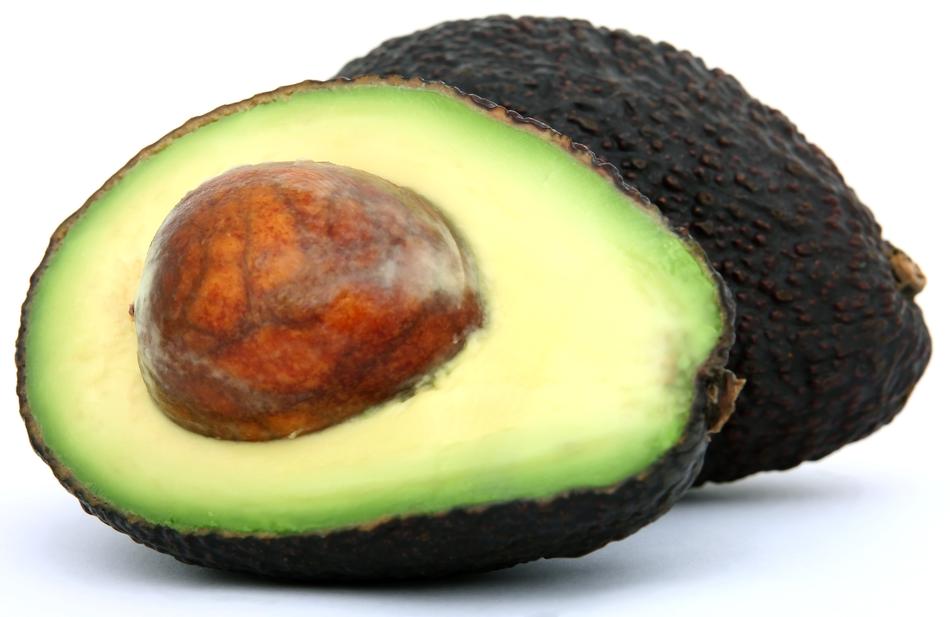 cut Avacado at white background