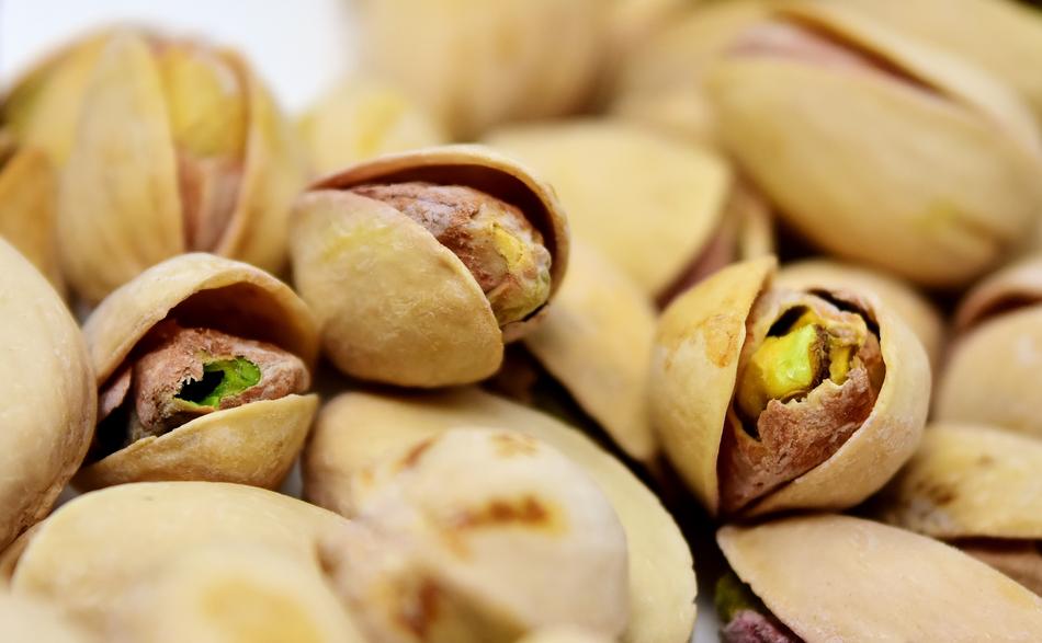 macro photo of salted pistachios