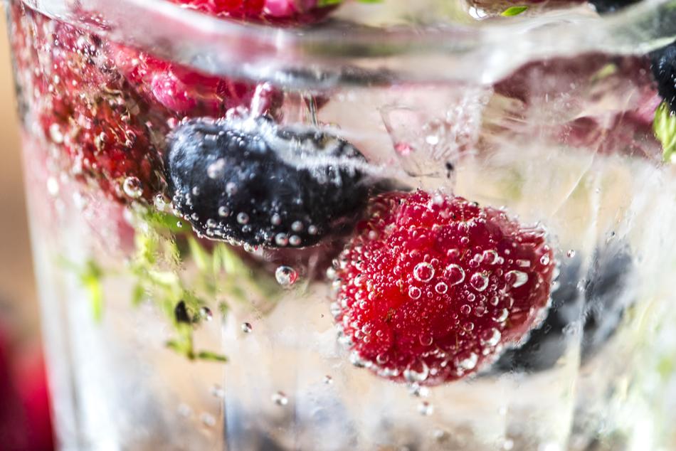 ripe berries in mineral water