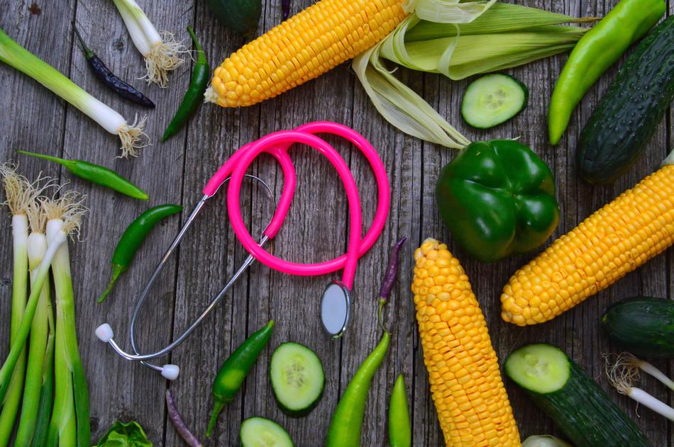 Fresh Healthy Vegetables and pink stethoscope