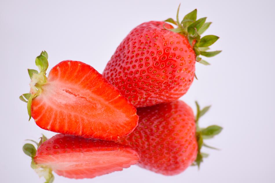 two Strawberries with reflection