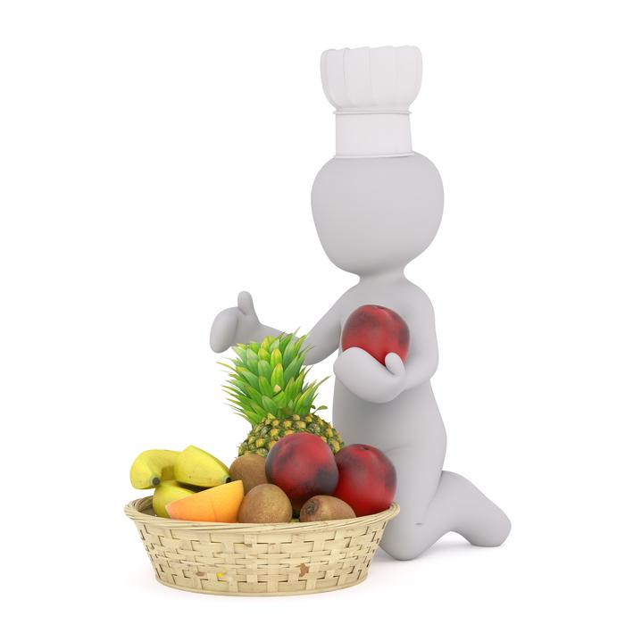 white chef figure and fruit basket