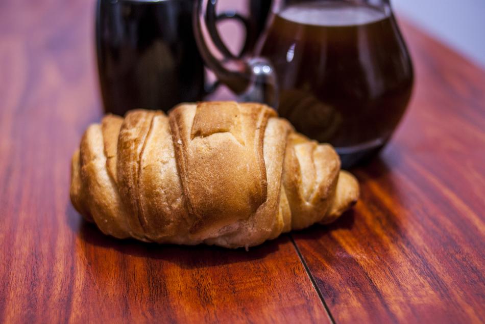 croissant and drink on the table