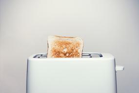 bread in a toaster for breakfast
