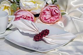 Napkin with Ruby Beads Ring on plate