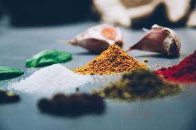 Close-up of the colorful and beautiful spices and herbs, in light and shadow