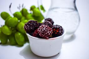 frozen Blackberries in white bowl