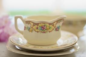 creamer for tea party on a blurred background