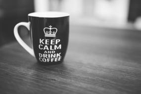 black and white, coffee mug on the table