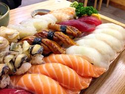 japanese sushi on a large wooden board