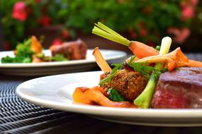 meat with vegetables on plate