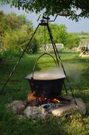 Soup Stewing in pot above campfire