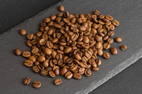 a handful of roasted coffee beans