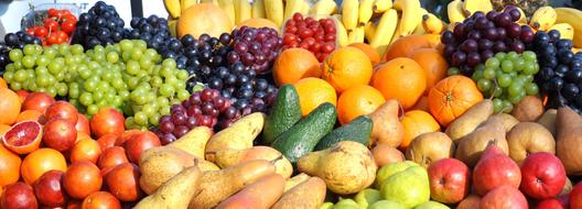 Many, beautiful, colorful, ripe, different fruits , in light