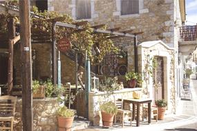 view of the greek restaurant on a sunny day