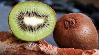 half ripe kiwi with seeds