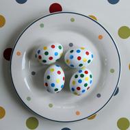 eggs with colored dots on a plate