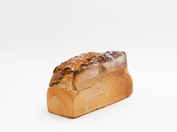 Close-up of the baked bread pastry, on the white surface