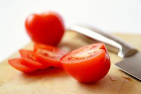 Tomatoes Sliced by Knife