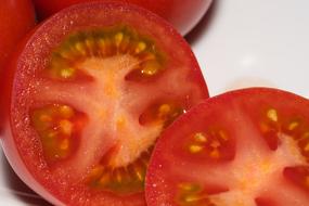 ripe tomatoes in a cut close-up