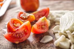 chopped tomato and onion on the table