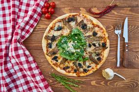 pizza on a wooden table