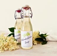 elderflower in transparent bottles