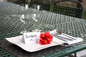 served table for dinner with glasses in the restaurant