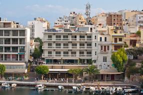 boats in the port in the city in Greece