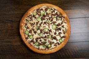 meat pizza with cheese and green pepper