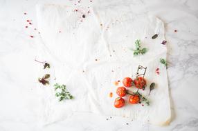 tomatoes on White Table Cloth