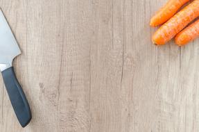 Knife and Food on Wood table