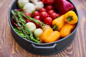 variety of fresh vegetables in a bowl on the table