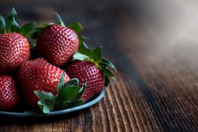 Red Ripe Strawberries at light