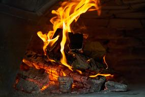 wood burning flame in the stove close up