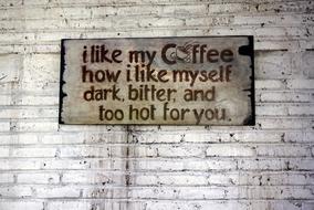 Coffee Drink sign on Brick Wall