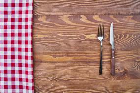 kitchen utensils on a wooden table